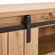 Nahaufnahme eines Lowboards aus Holz mit schwarzem Metallelement, seitliche Perspektive