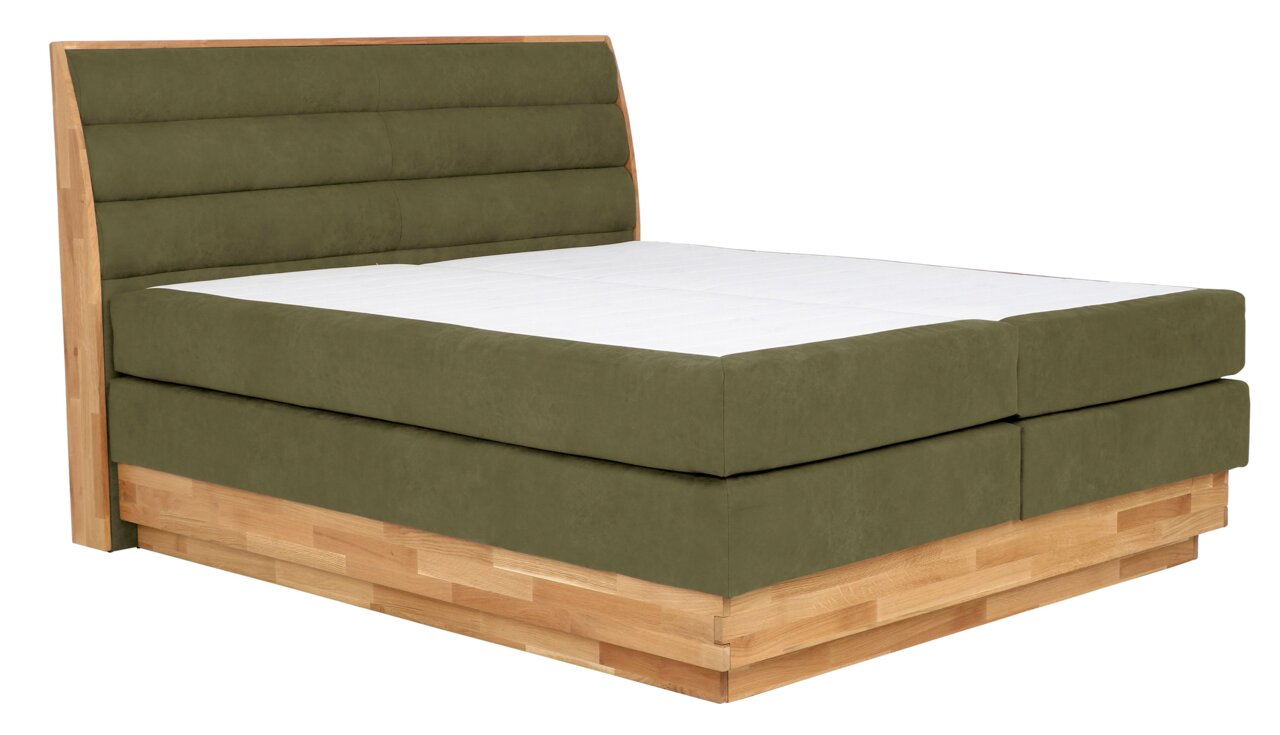 Boxspringbett mit olivgrünem Stoffbezug und Holzrahmen, seitliche Perspektive