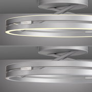 Moderne Deckenleuchte PURE Loop in silberner Optik, seitliche Perspektive mit leuchtendem LED-Ring.