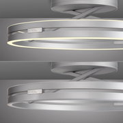 Moderne Deckenleuchte PURE Loop in silberner Optik, seitliche Perspektive mit leuchtendem LED-Ring.