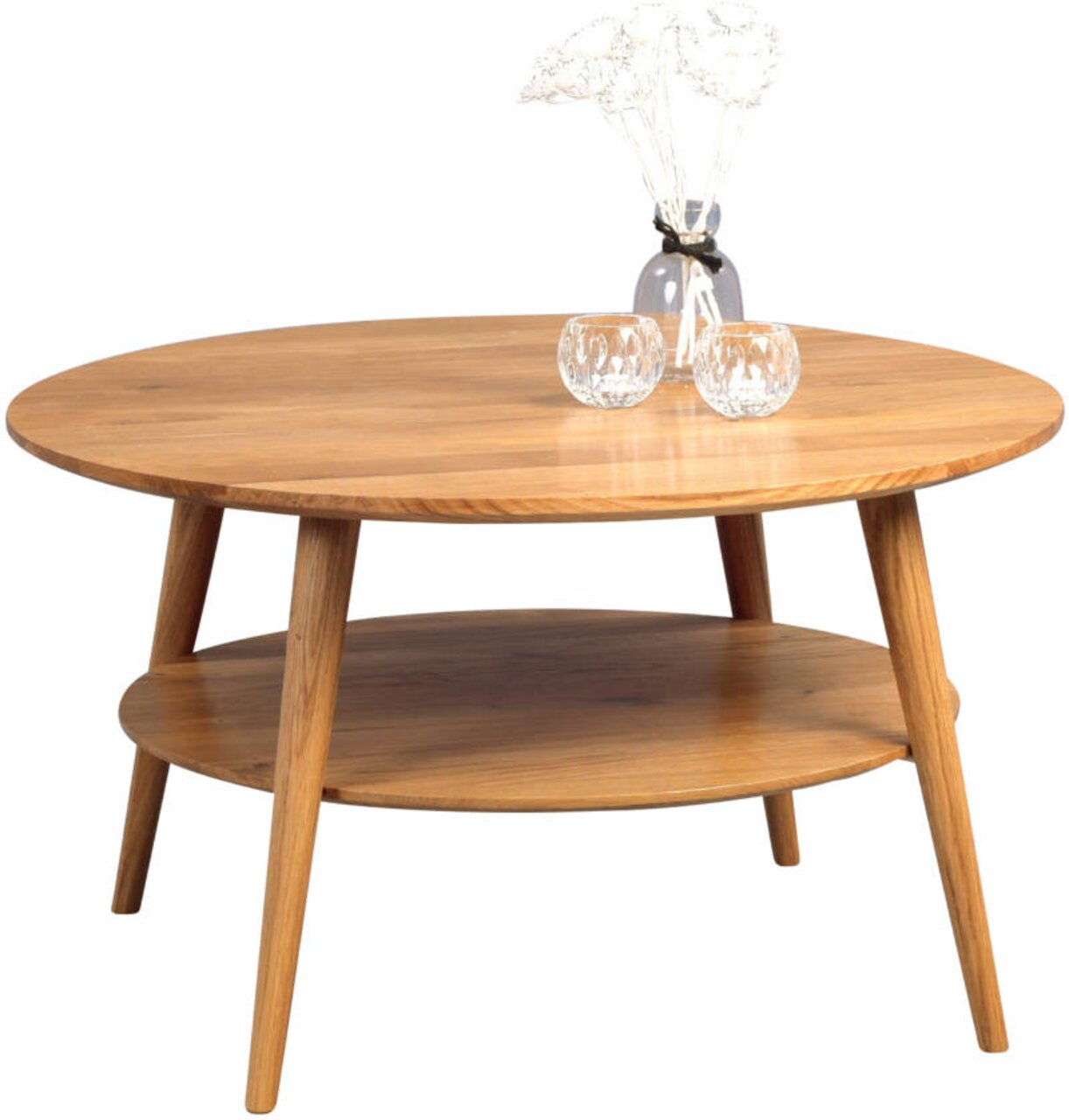 Ronde houten salontafel met twee niveaus, versierd met een vaas en twee theelichthouders, zijaanzicht