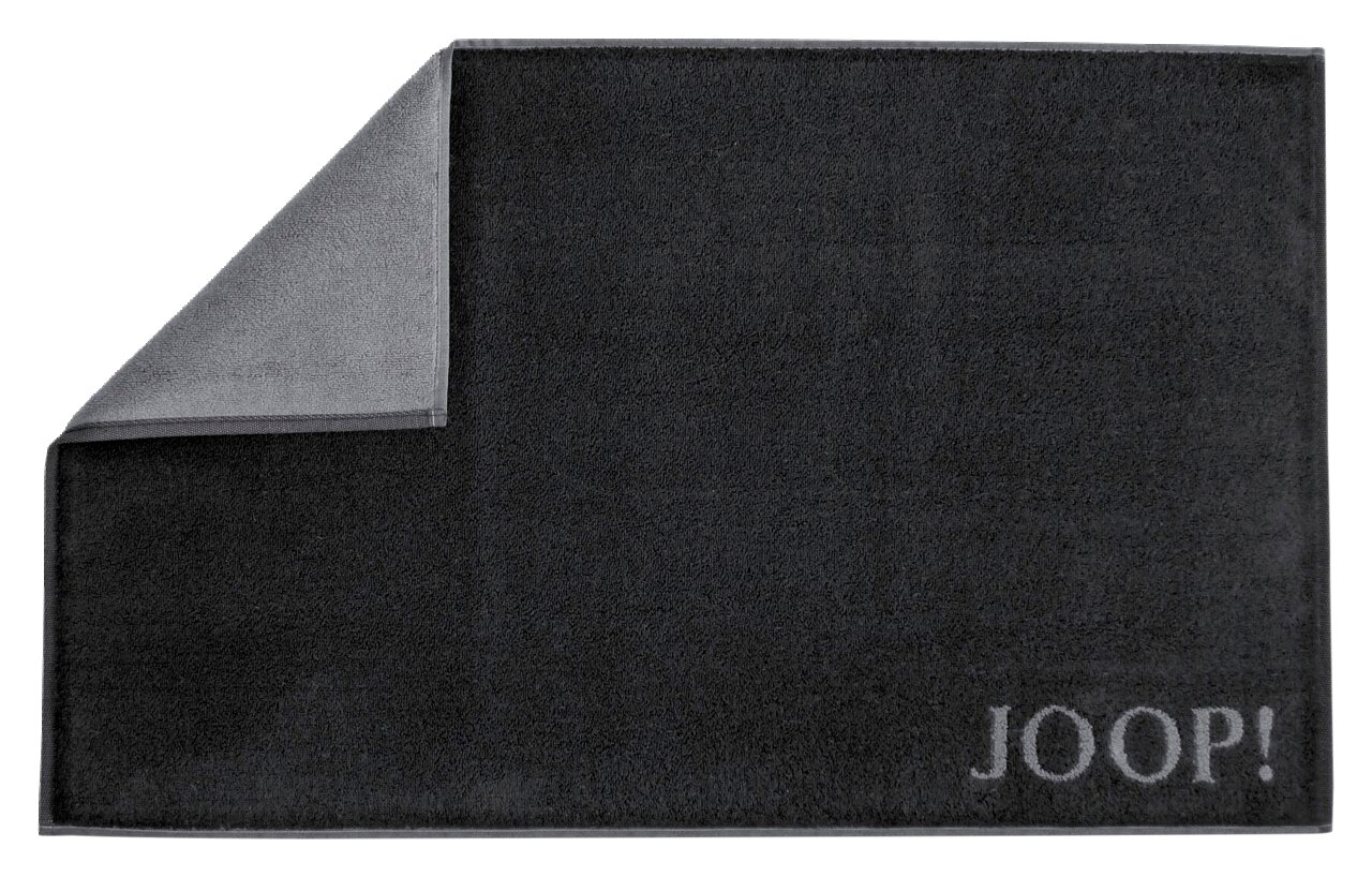 JOOP! Badematte DOUBLEFACE JOOP! Badematte DOUBLEFACE in dunklem Grau, Draufsicht mit umgeschlagener Ecke, zeigt das zweifarbige Design.