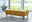 Beldomo Style XXL-Hocker KLAGENFURT Gelber XXL-Hocker in modernem Wohnzimmer, seitliche Perspektive mit Blick auf große Fenster und grüne Landschaft im Hintergrund.