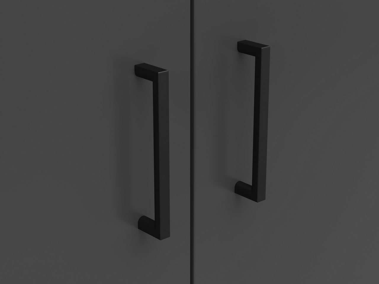 Carryhome Kommode MULTISTAURAUM Nahaufnahme von zwei schwarzen Griffen an einer dunklen Kommode, Frontalansicht