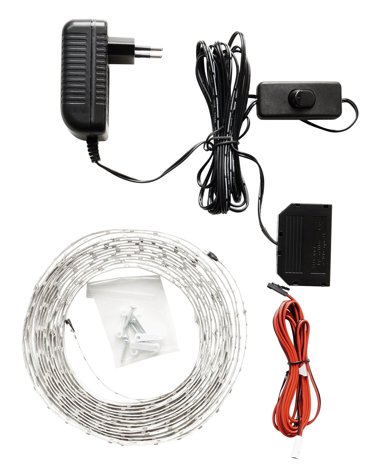 LED-Bandbeleuchtung Set mit Netzteil, Schalter, LED-Streifen, Befestigungsmaterial und Kabel, aus der Vogelperspektive fotografiert.