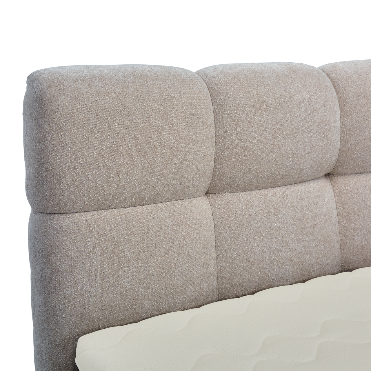 Nahaufnahme eines gepolsterten Boxbett-Kopfteil in Beige, seitliche Perspektive