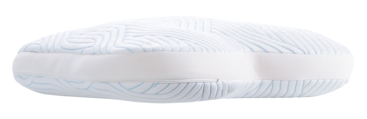 Seitliche Ansicht eines ergonomischen Schlafkissens mit strukturierter Oberfläche und weißem Bezug.