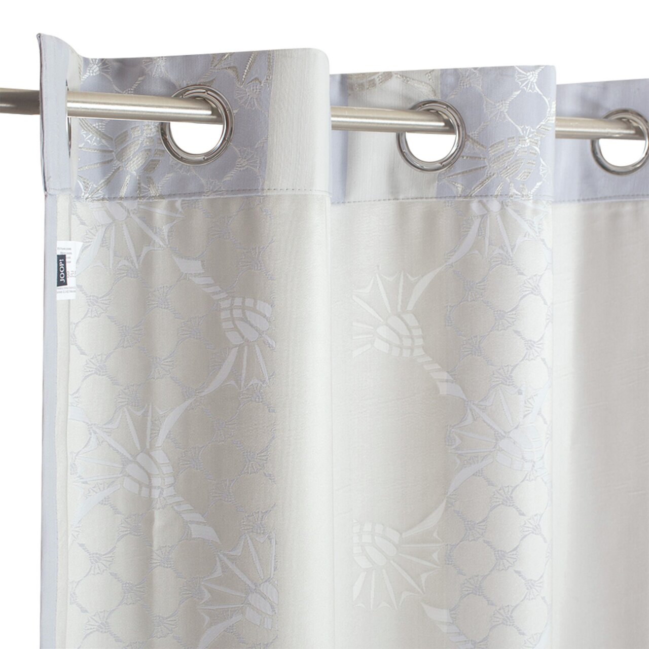 JOOP! Ösenschal J!REFLECTION ca.140x250cm Ösenvorhang mit floralem Muster in Nahaufnahme, aufgehängt an einer Metallstange