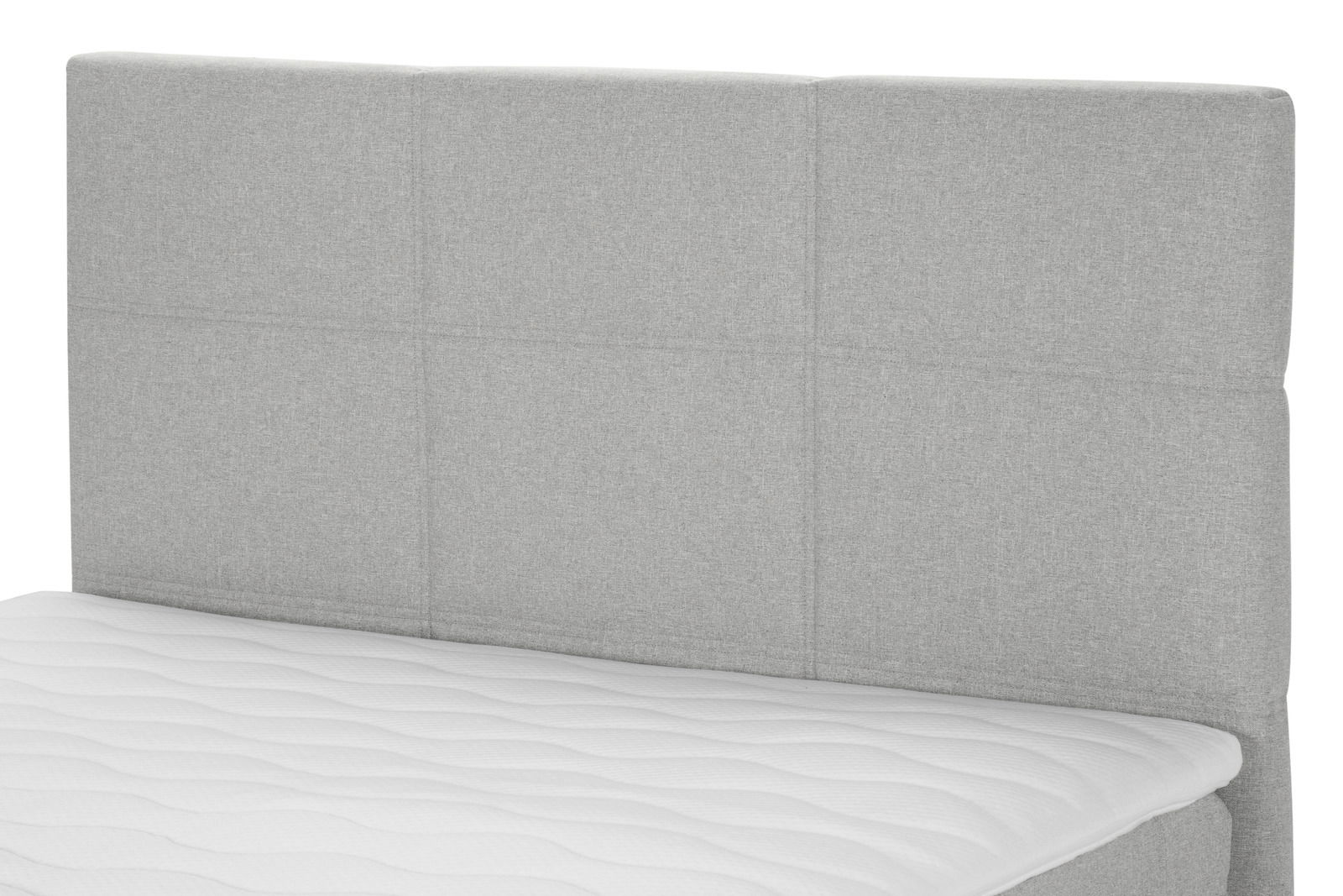 Graues Boxspringbett mit gestepptem Kopfteil, seitliche Perspektive