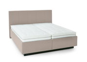 Gestoffeerd bed in beige met twee matrassen, zijaanzicht