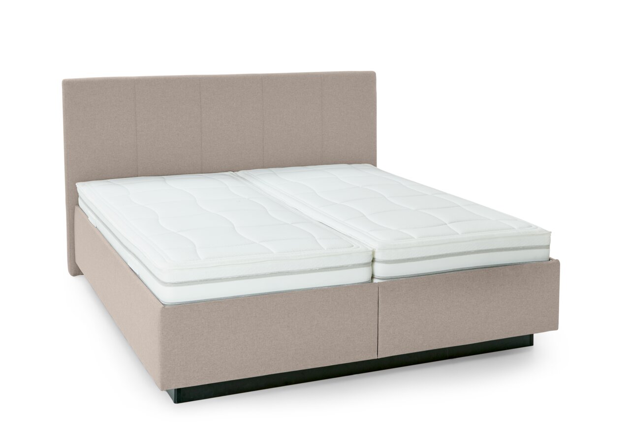 Gestoffeerd bed in beige met twee matrassen, zijaanzicht