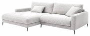 Graues Longchair-Sofa mit zwei Kissen, seitliche Perspektive