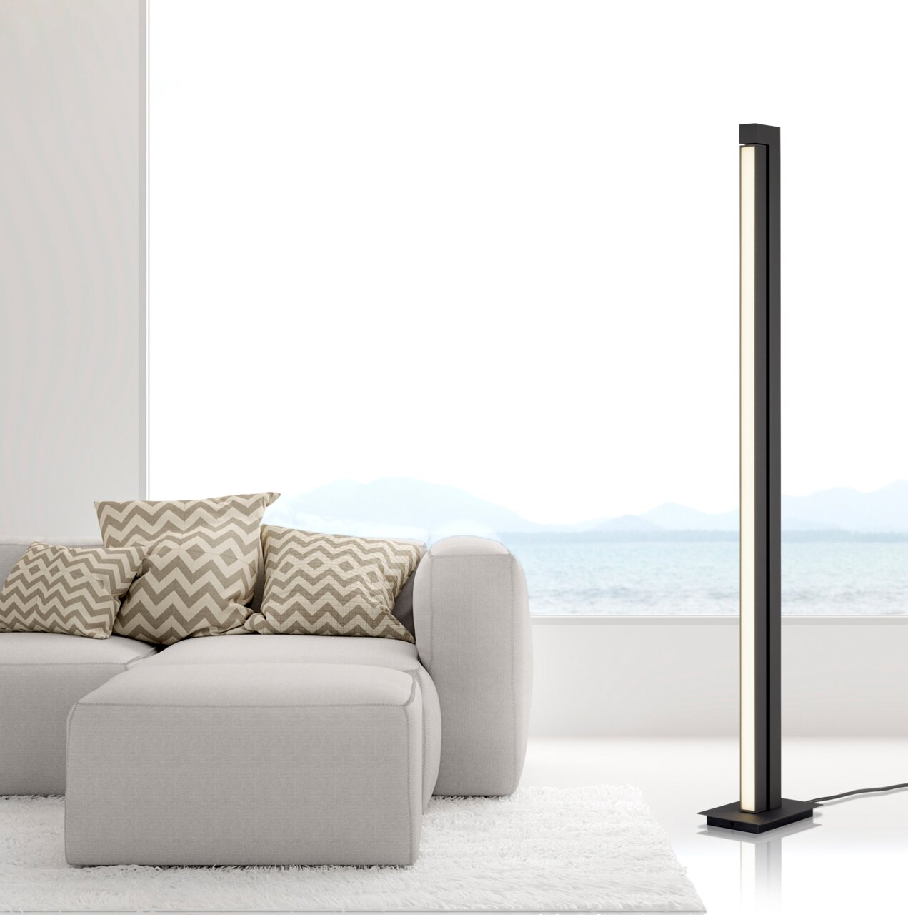 Neuhaus Pure Stehleuchte PURE-LINES Moderne Stehleuchte PURE-LINES von Paul Neuhaus in einem eleganten Wohnzimmer, seitliche Perspektive.