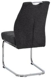 Rückansicht eines modernen Schwingstuhls mit grauem Stoffbezug und verchromtem Gestell.