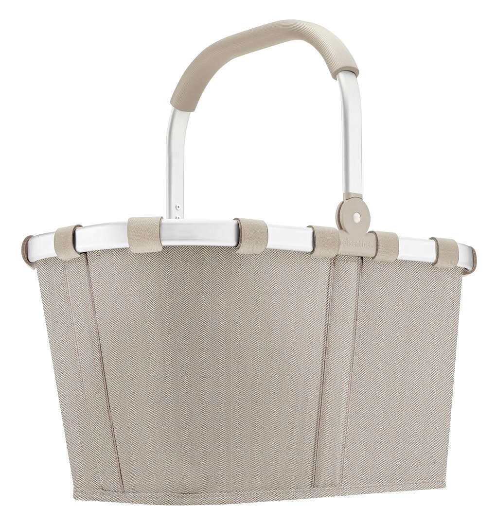 Seitenansicht eines sandfarbenen Carrybags mit Fischgrätenmuster und stabilem Griff.