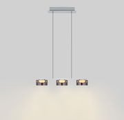 Moderne LED-Pendelleuchte DUNE mit drei Leuchtkörpern, hängend von der Decke, seitliche Perspektive.