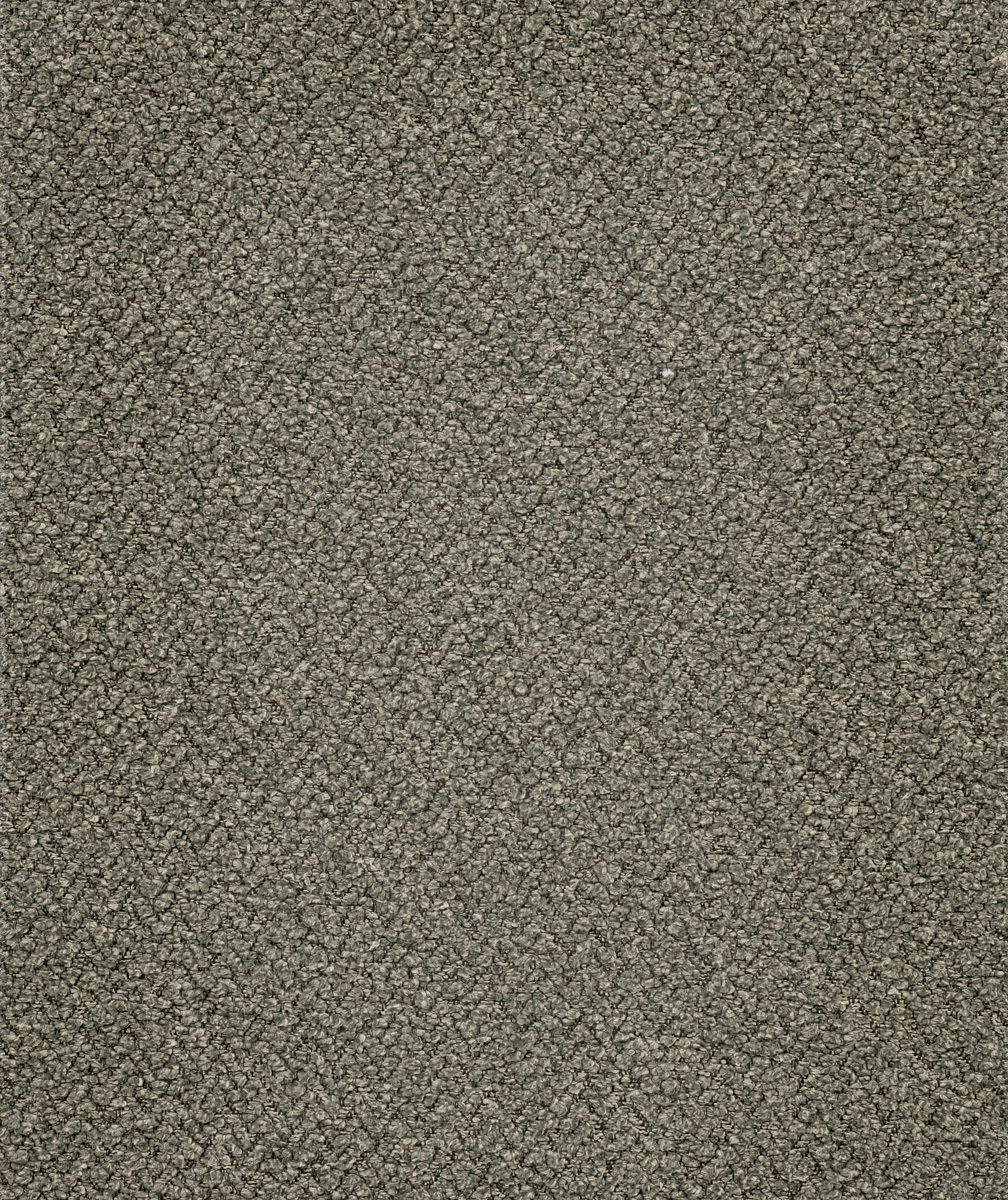 Nahaufnahme einer grauen, strukturierten Stoffoberfläche, von oben betrachtet.