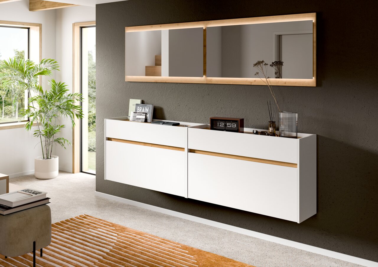 MID.YOU Garderobenkombi inkl. LED DRIVE Modernes, schwebend montiertes Sideboard in Weiß mit Holz-Akzentfuge unter einem breiten Wandspiegel mit Holzrahmen; Szene in leichter Schrägansicht von vorn.