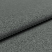 Nahaufnahme einer grauen, strukturierten Stoffoberfläche, die für Musterring Sofa MR 300 verwendet wird.