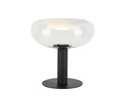 Moderne Tischleuchte mit klarem Glas und schwarzem Sockel, seitliche Perspektive