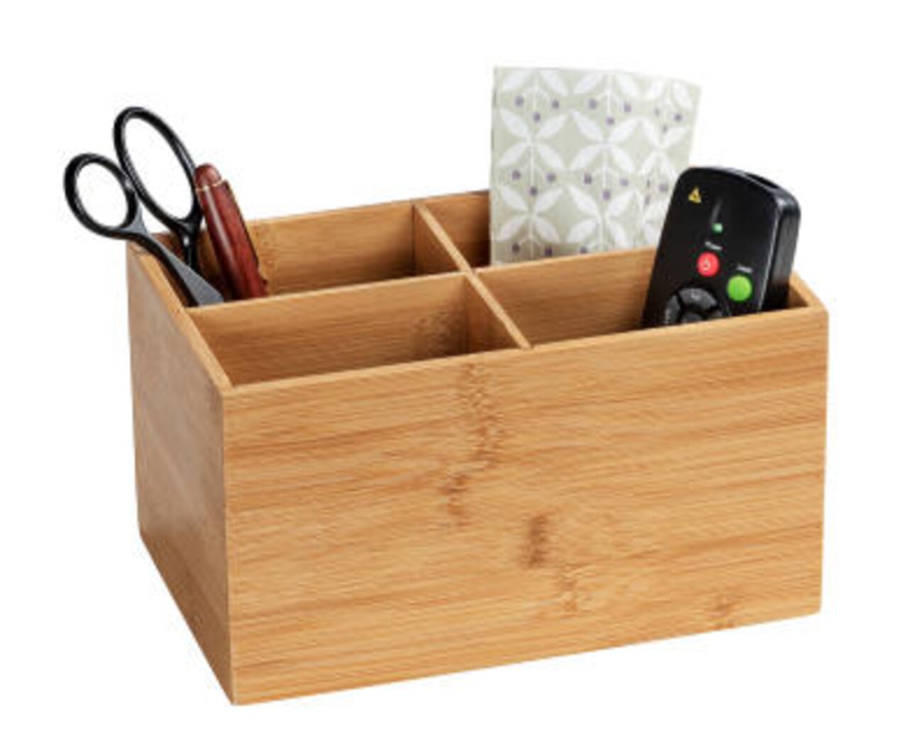 Bambus Box Terra mit vier Fächern, gefüllt mit Schere, Stift, Fernbedienung und dekorativem Papier, aus seitlicher Perspektive.