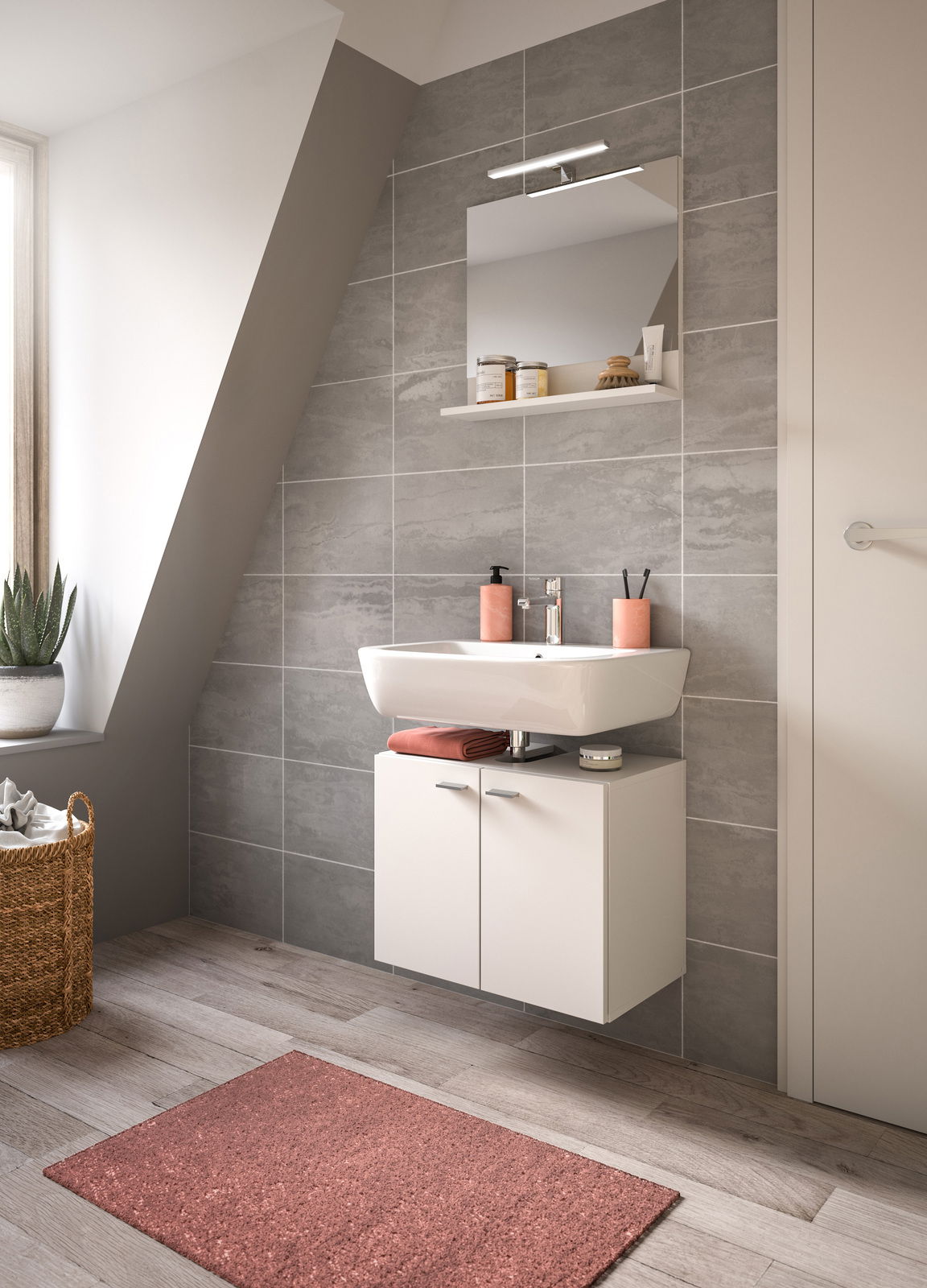 Moderne Badkombination mit Waschbecken, Spiegel und Unterschrank in einem stilvollen Badezimmer mit grauen Fliesen, aus seitlicher Perspektive.