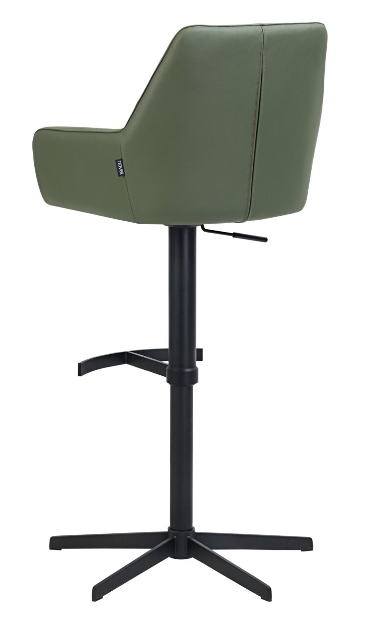 Achterkant van een groene barkruk met een zwart metalen frame en voetsteun