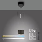 Schwarze LED-Pendelleuchte mit zylindrischem Schirm und höhenverstellbaren Seilaufhängungen, frontale Ansicht von leicht unten; mit Icons für dimmbar, CCT-Farbtemperatur 2700–5000 K, Nachtlicht, Memory-Funktion und Fernbedienung.