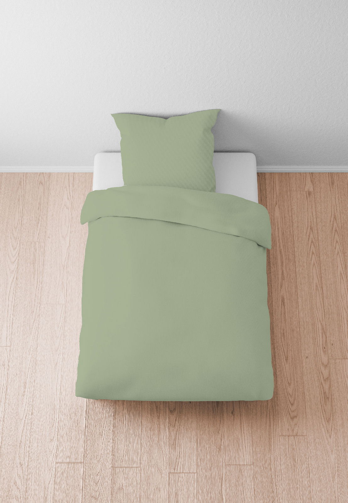 Grüne Bettwäsche 155x220cm auf einem Bett, Vogelperspektive