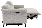 Seitenansicht eines hellgrauen, modernen Sofas mit verstellbarer Rückenlehne und schwarzen Beinen.