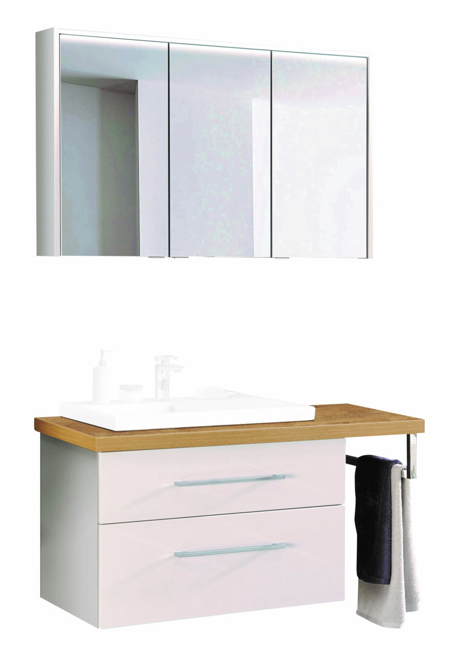 Moderne Badkombination mit Spiegelschrank und Waschtisch aus Holz und weißen Schubladen, seitliche Perspektive