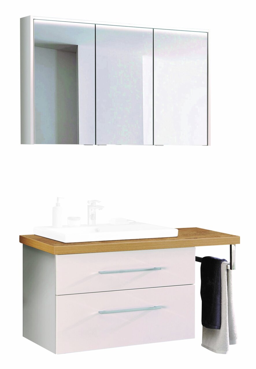 Moderne Badkombination mit Spiegelschrank und Waschtisch aus Holz und weißen Schubladen, seitliche Perspektive