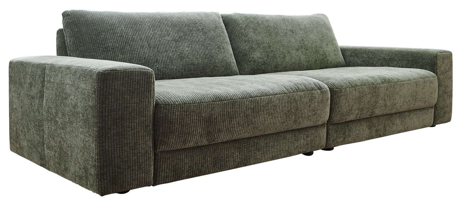 Grünes Megasofa mit breiten Armlehnen, aus einer leicht seitlichen Perspektive fotografiert