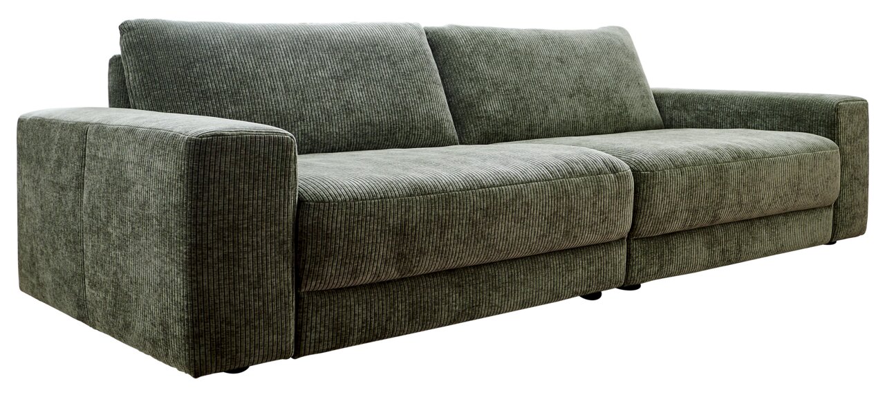 Zurbrüggen Big Sofa HAMBURG Grünes Megasofa mit breiten Armlehnen, aus einer leicht seitlichen Perspektive fotografiert