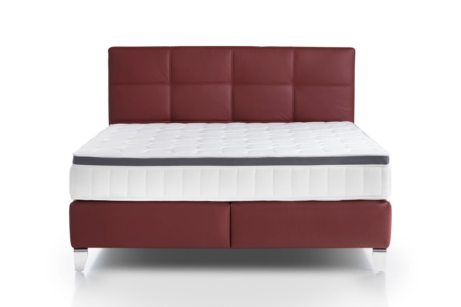 Boxspringbett mit rotem Kopfteil und weißer Matratze, Frontalansicht