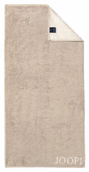 Beiges Handtuch mit eingewebtem JOOP! Logo, Draufsicht