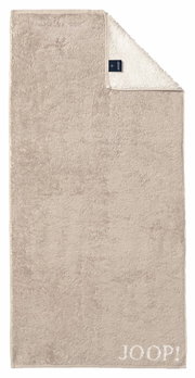 Beiges Handtuch mit eingewebtem JOOP! Logo, Draufsicht