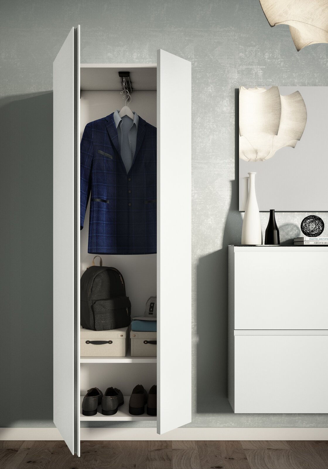 Moderne witte hangkast met twee deuren, geopend, met daarin een pak, schoenen en opbergdozen, gezien vanuit het vooraanzicht.