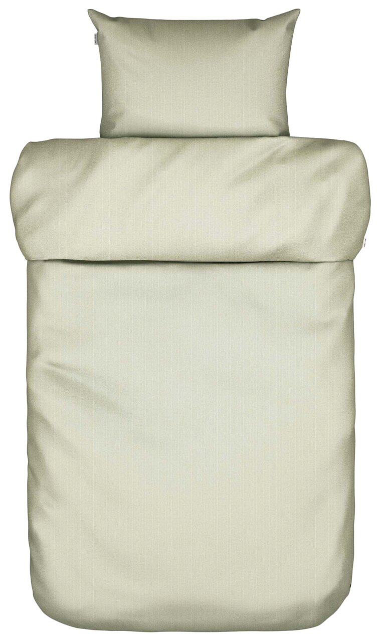 Bettwäsche-Set in Beige, bestehend aus einem Kissenbezug und einem Bettdeckenbezug, aus der Vogelperspektive fotografiert.