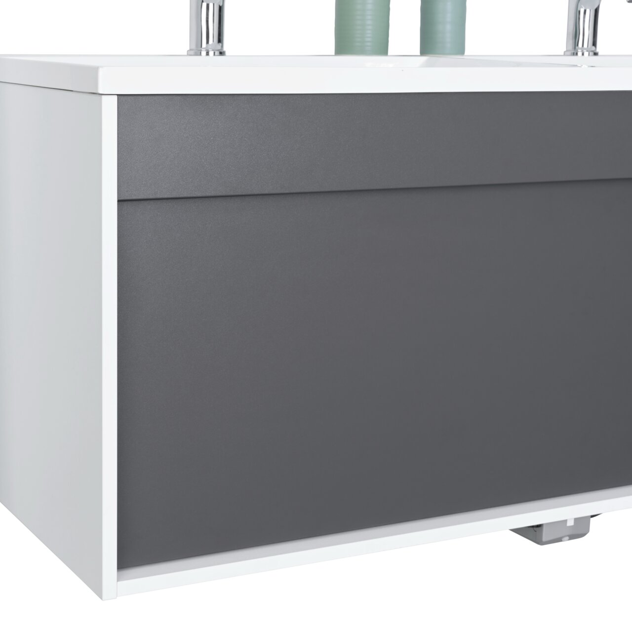 Moderner Waschplatz mit grauer Front und weißem Korpus, seitliche Perspektive