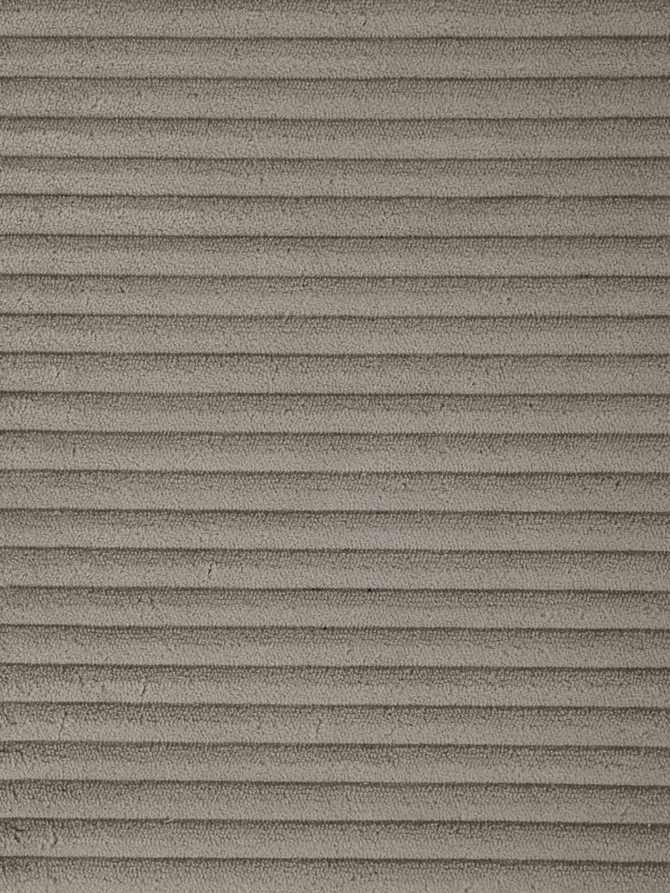 Nahaufnahme eines grauen, gerippten Stoffes, der für einen Schwingstuhl verwendet wird, aus der Vogelperspektive.