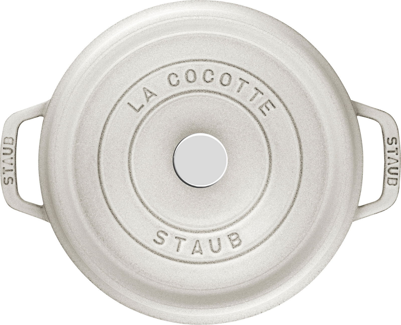 Runde, cremefarbene Bräter Cocotte von oben mit der Aufschrift 'La Cocotte Staub' auf dem Deckel.