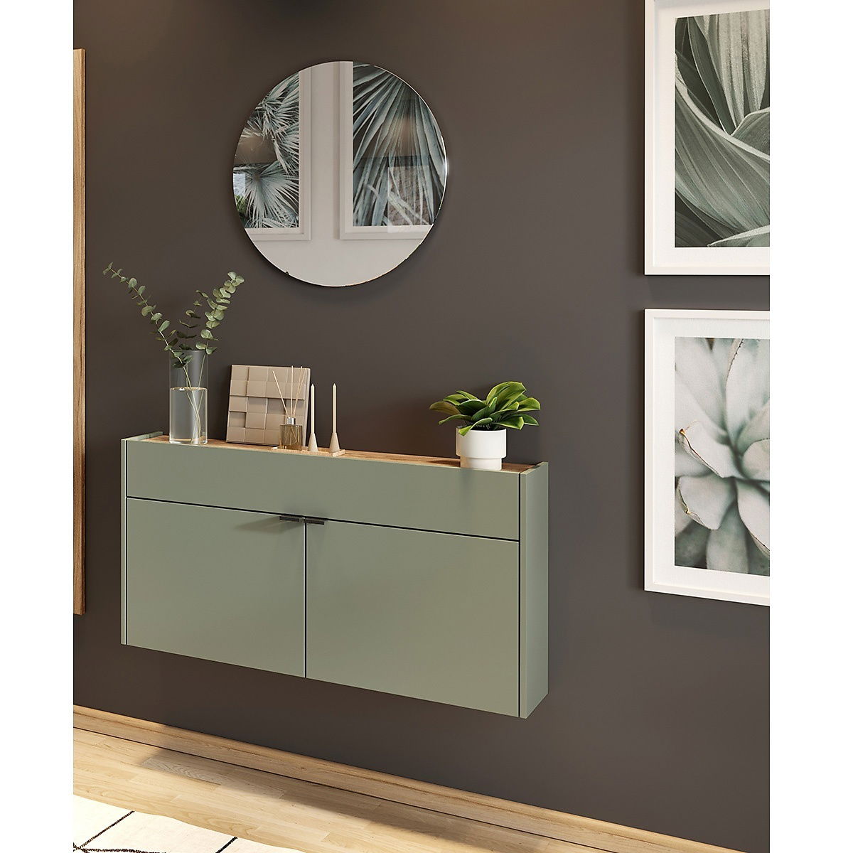 Moderne Garderobe in minimalistischem Design, mit grünem Schrank und Dekorationen, aus frontaler Perspektive.