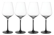 Vier Weißweinkelche mit transparentem Glas und schwarzem Stiel, frontal abgebildet.
