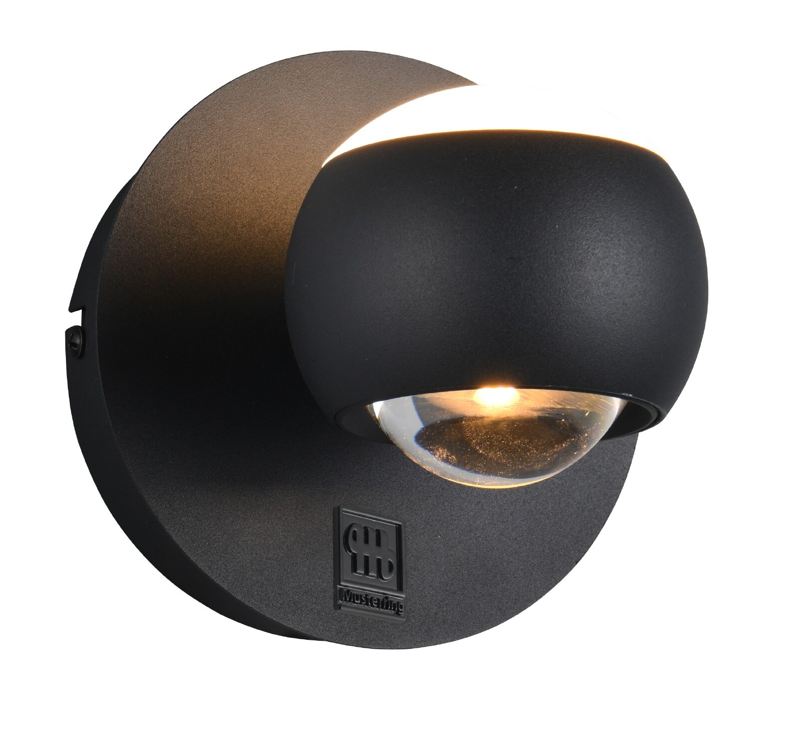 Moderne schwarze LED-Wandleuchte von Musterring mit runder Basis, gewölbtem Schirm und klarer Glaslinse, beleuchtet in frontaler Nahansicht leicht von unten