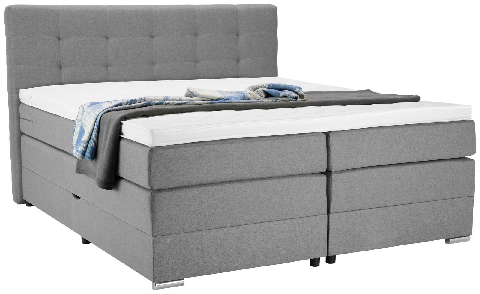 Graues Boxspringbett mit hohem Kopfteil, seitliche Perspektive