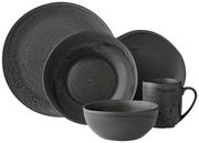 Schwarzes Kombiservice 20-teilig mit Tellern, Schalen und Tasse, Ansicht von vorne.