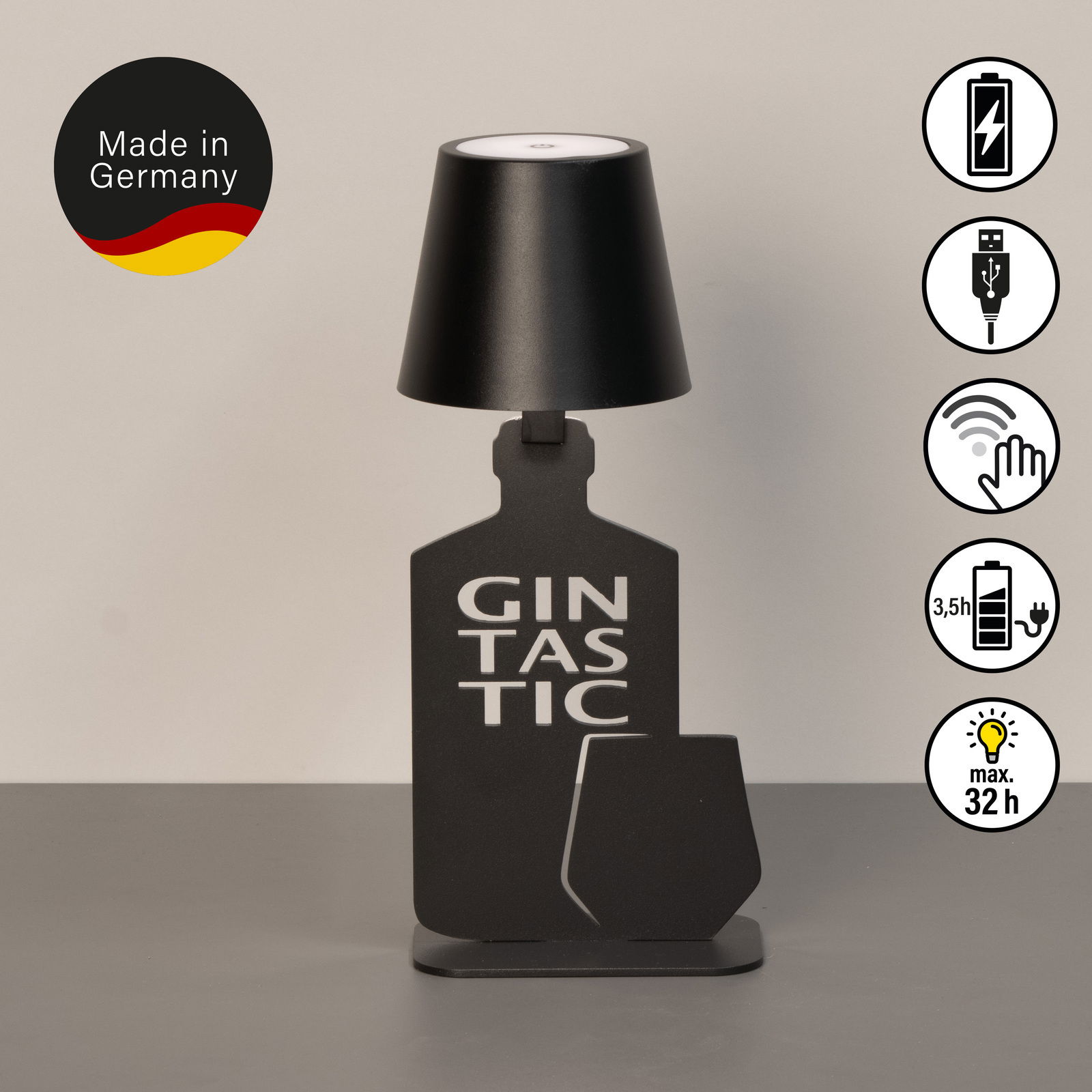 Akku-Tischleuchte in Form einer Flasche mit der Aufschrift 'Gintastic', schwarze Farbe, seitliche Ansicht, hergestellt in Deutschland.