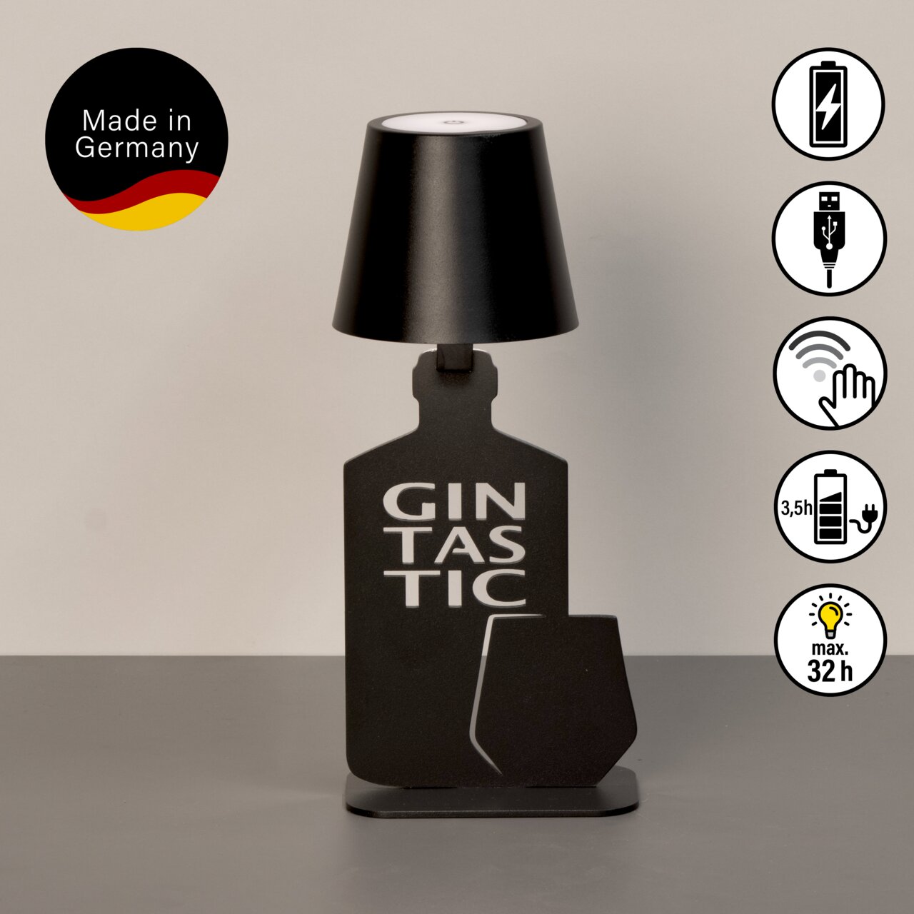 Akku-Tischleuchte in Form einer Flasche mit der Aufschrift 'Gintastic', schwarze Farbe, seitliche Ansicht, hergestellt in Deutschland.