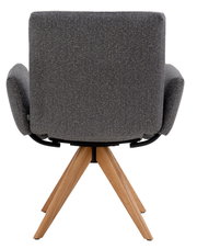 Rückansicht eines grauen Armlehnstuhls mit Holzbeinen, Modell COCOON von Dieter Knoll.